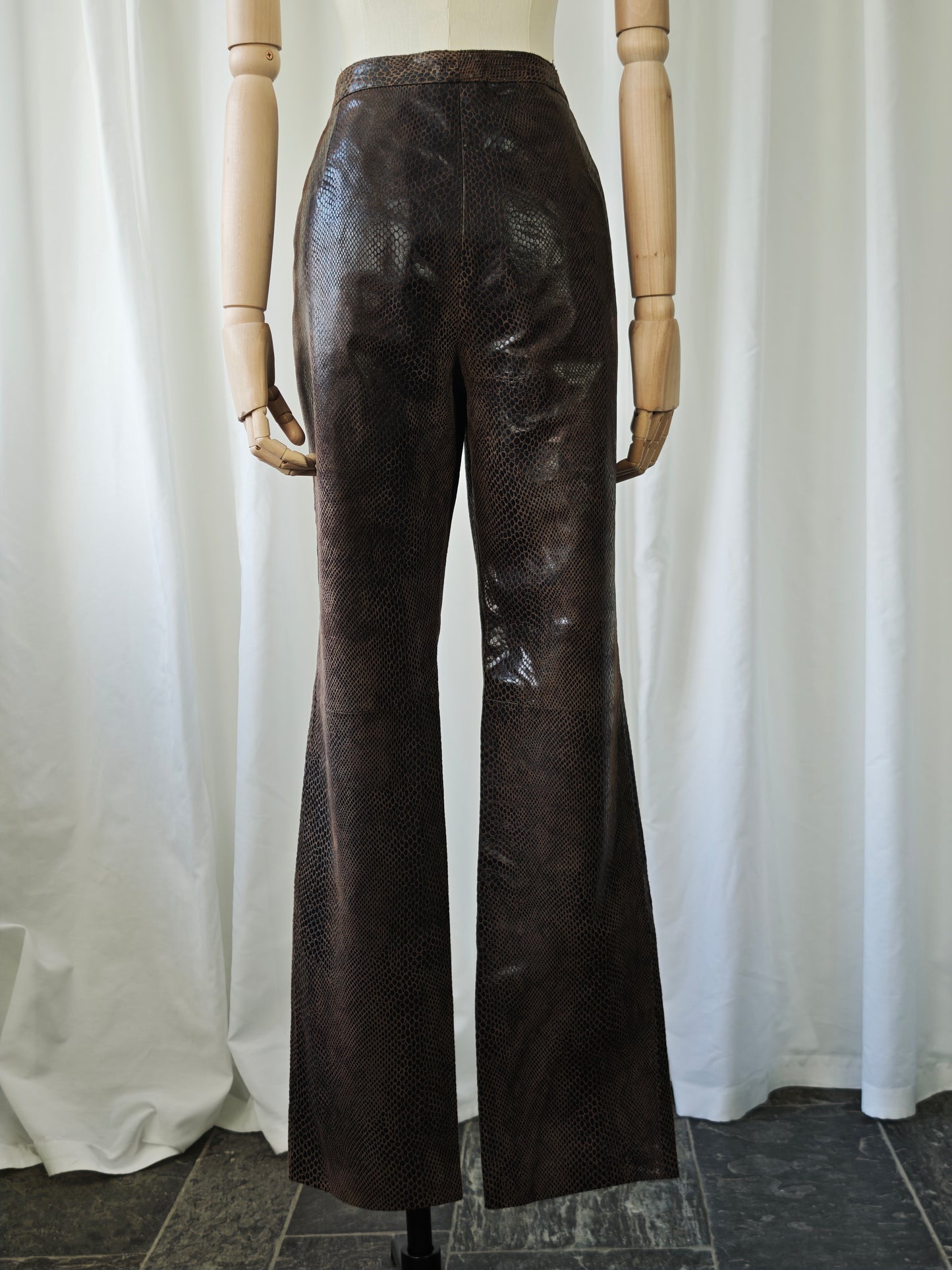 Crocodile print leather trousers