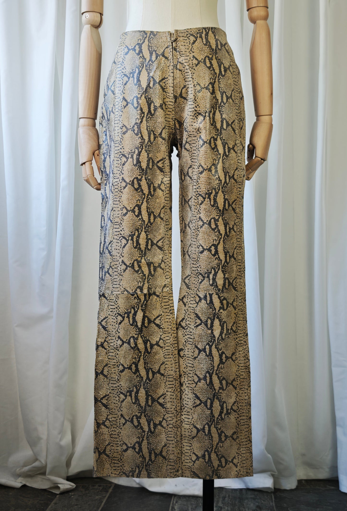 Leather snake print trousers