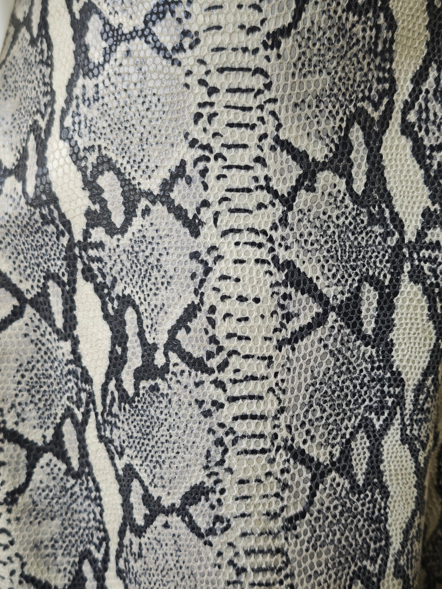 Leather snake print trousers