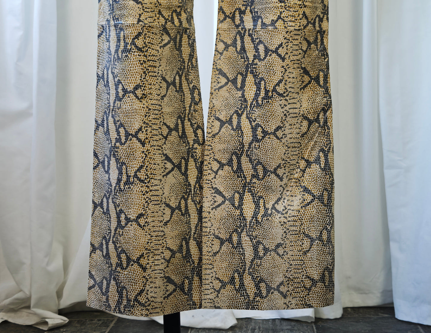 Leather snake print trousers