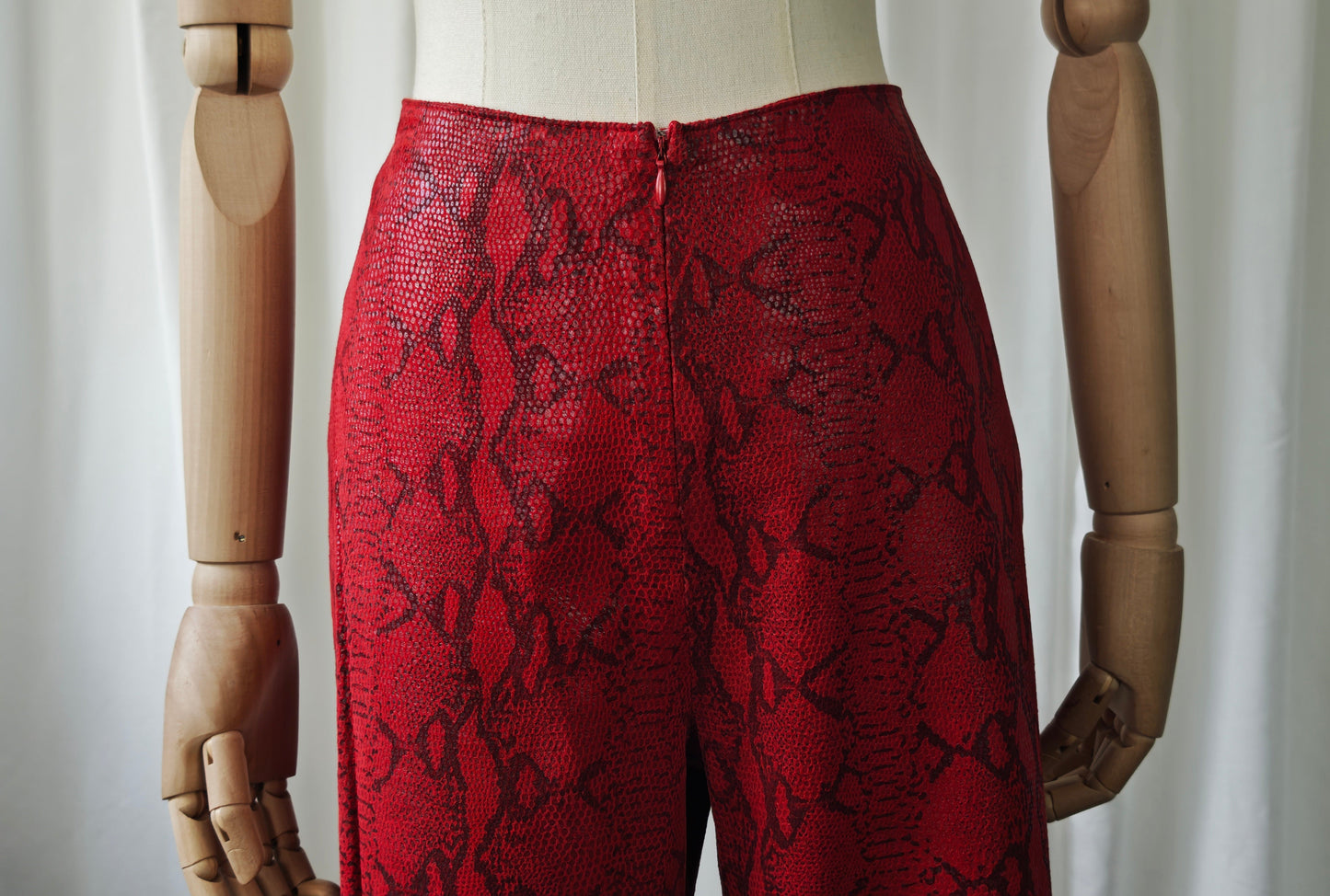 Leather snake print trousers