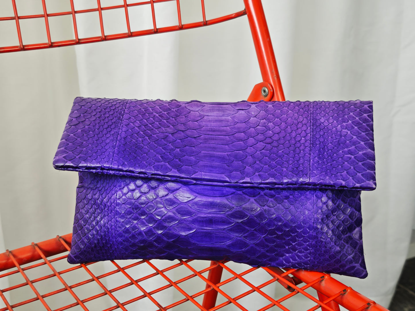 Purple snake clutch