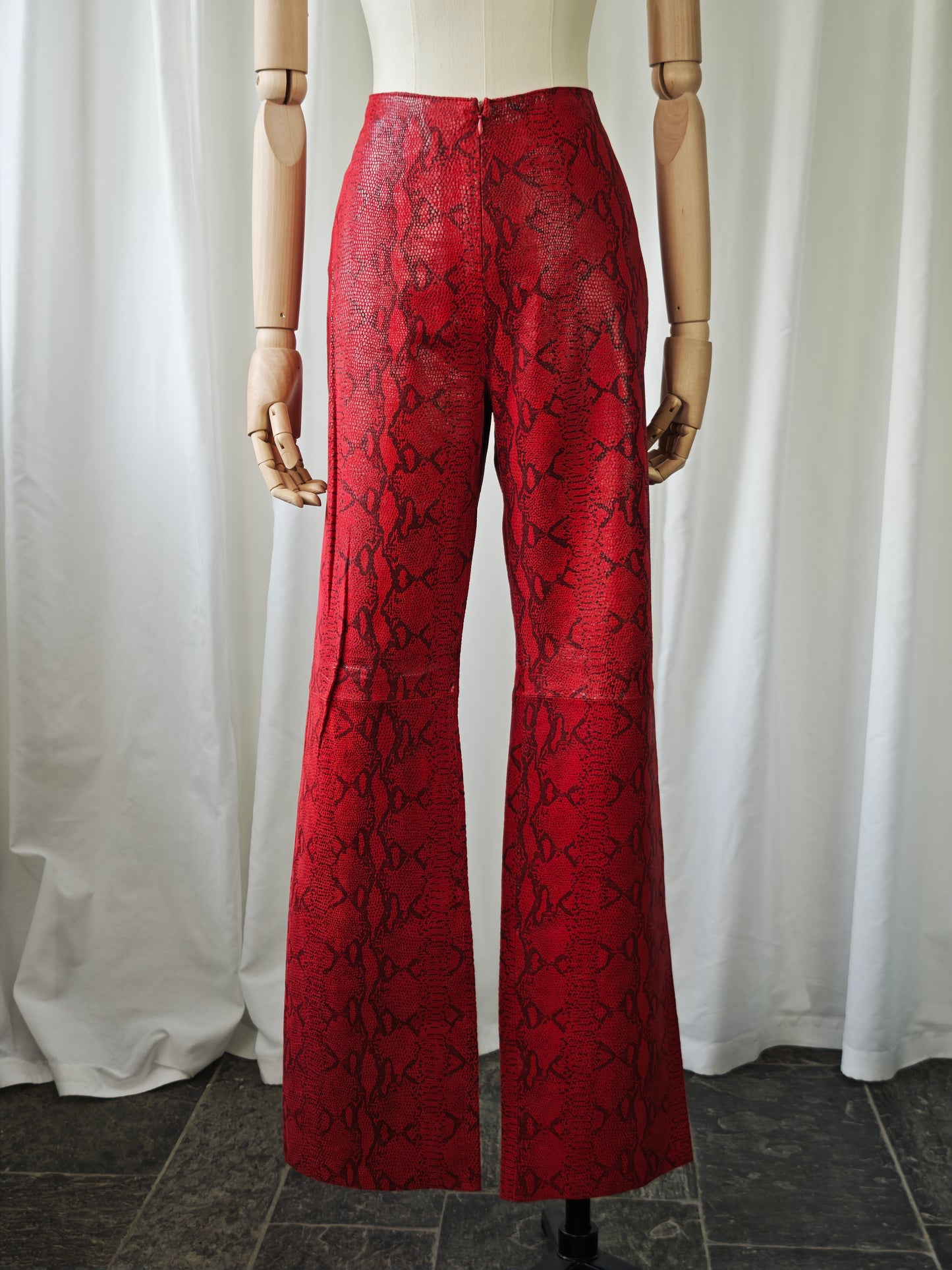 Leather snake print trousers