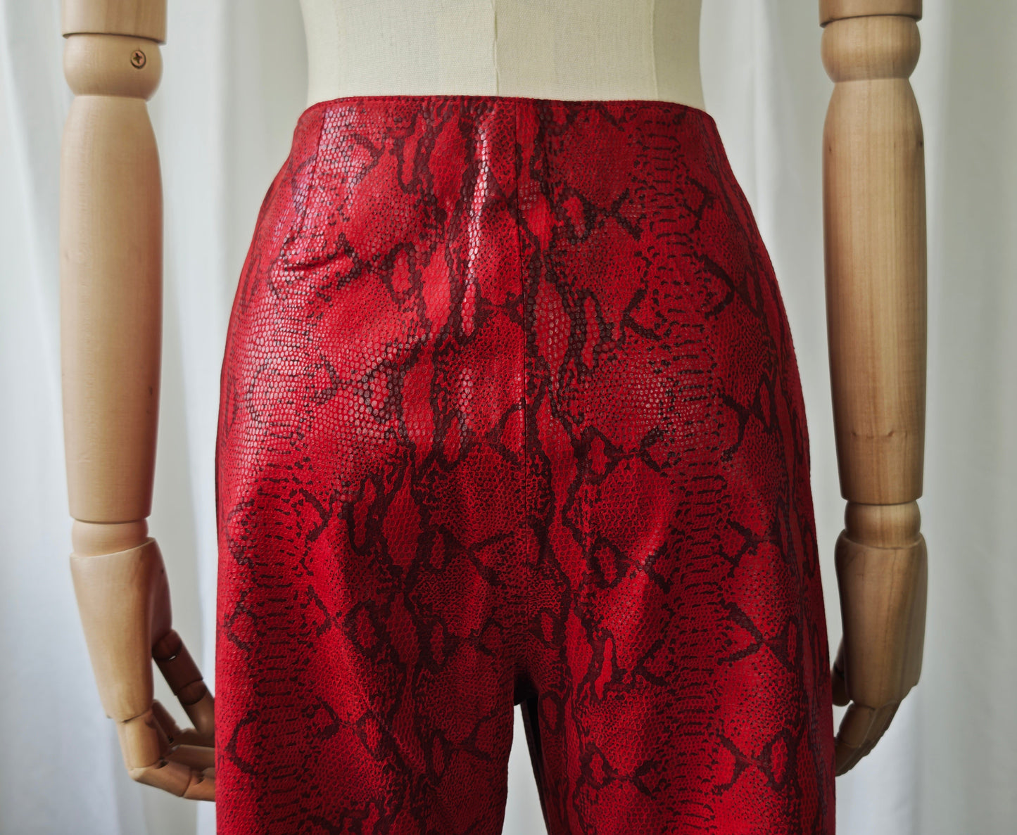 Leather snake print trousers