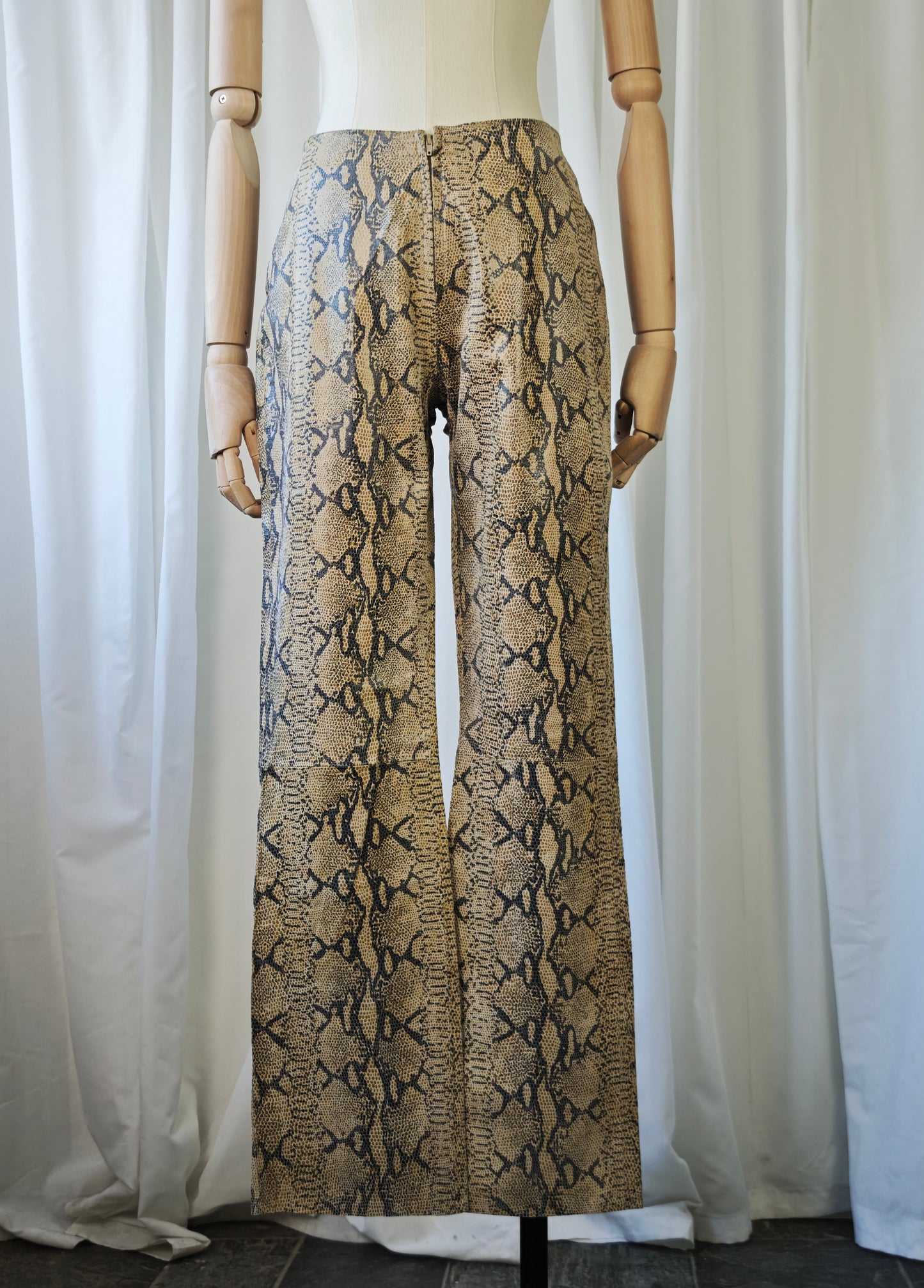 Leather snake print trousers