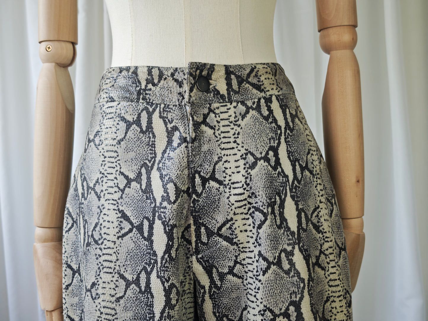 Leather snake print trousers
