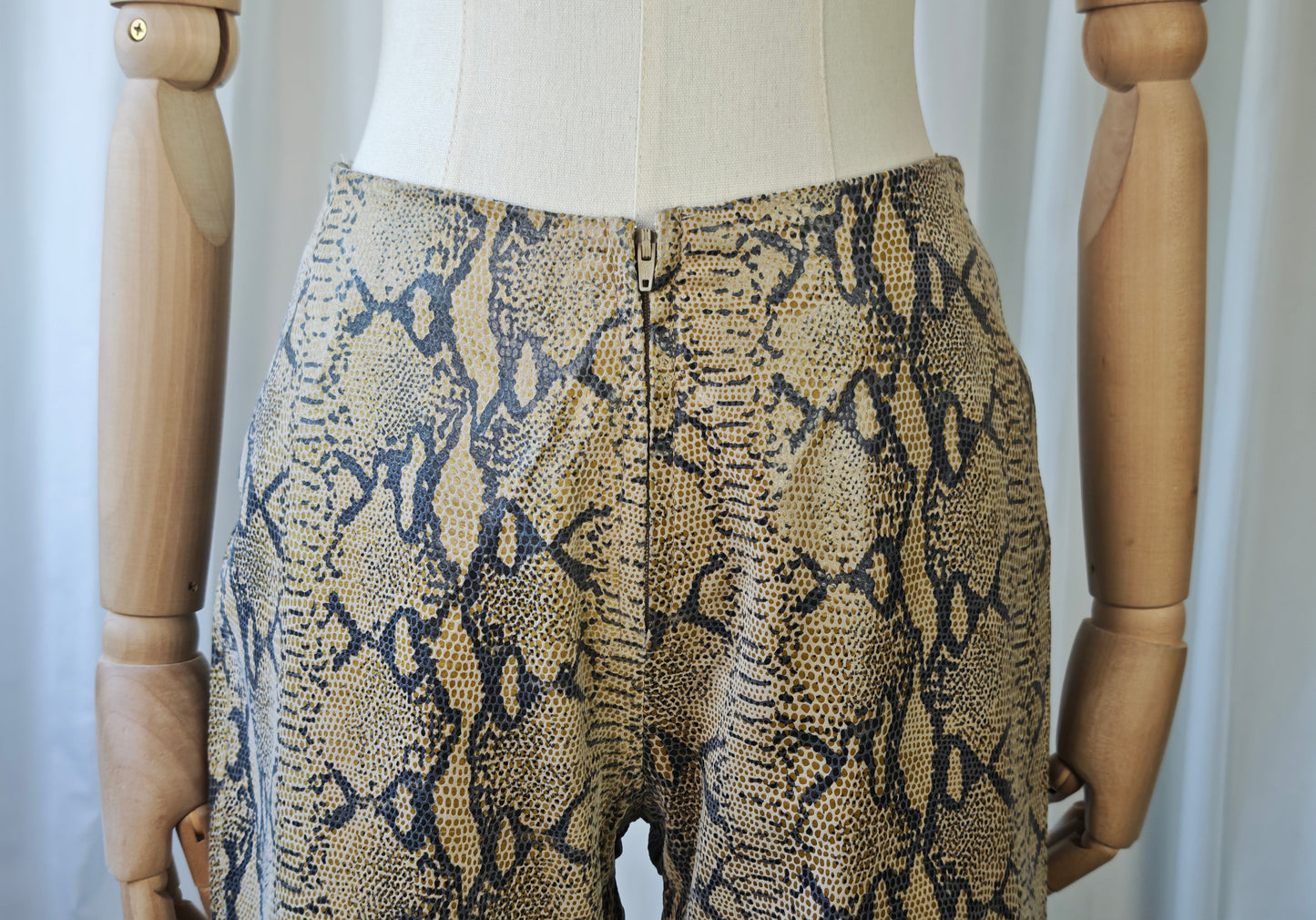 Leather snake print trousers