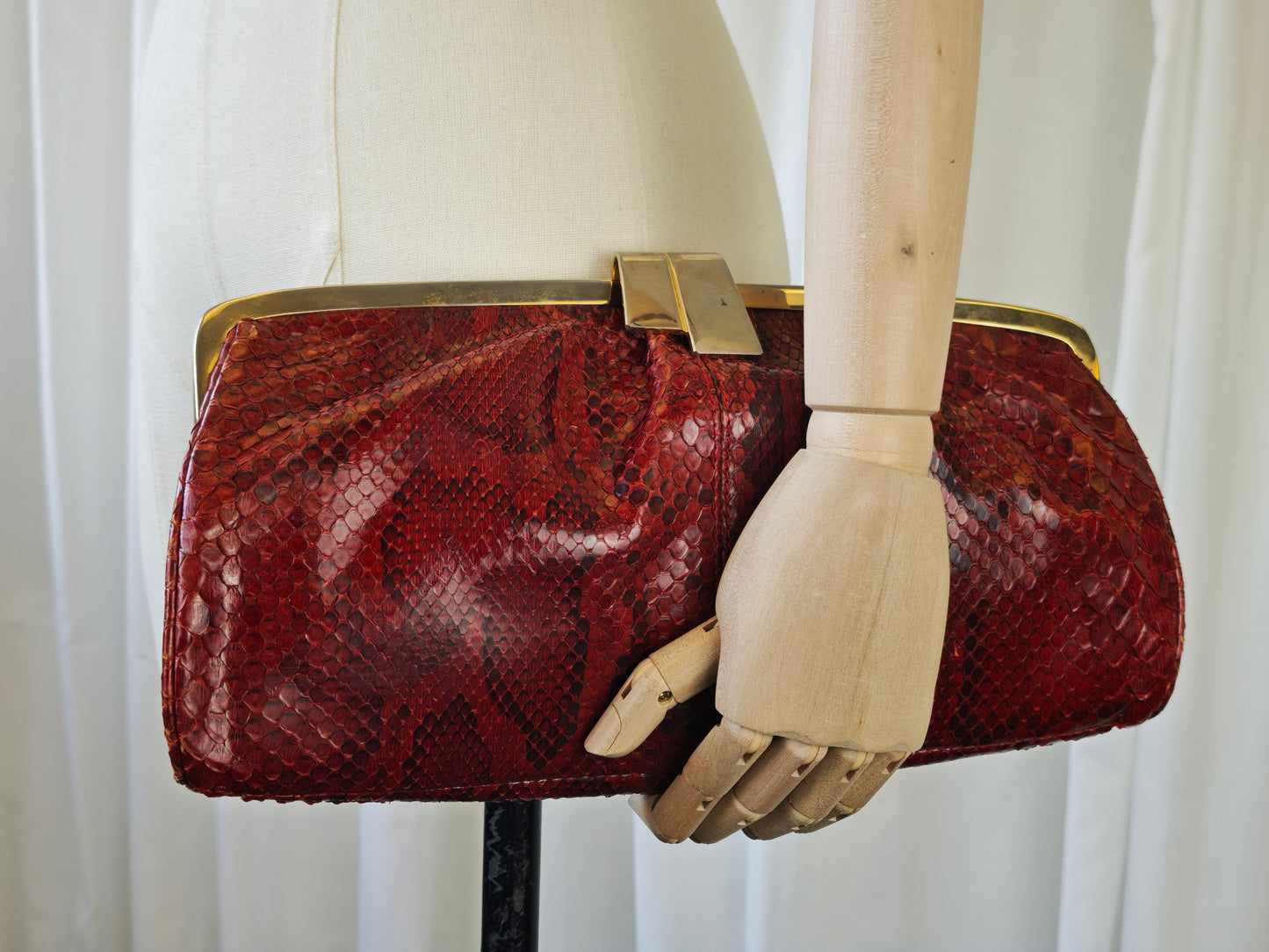 Burgundy snake clutch