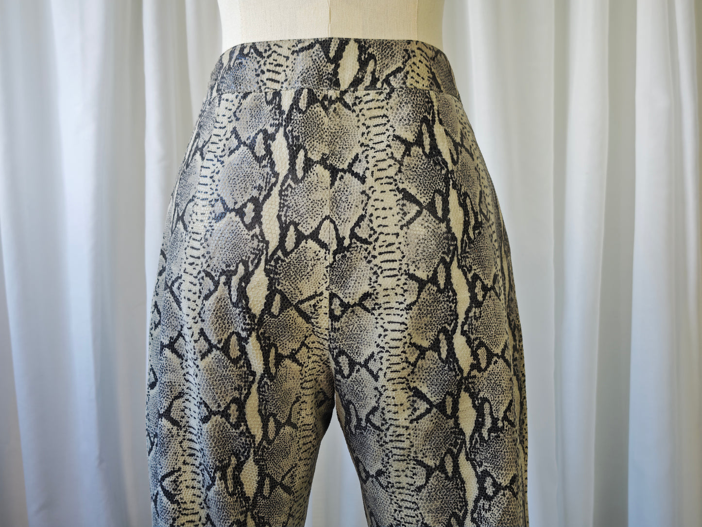 Leather snake print trousers