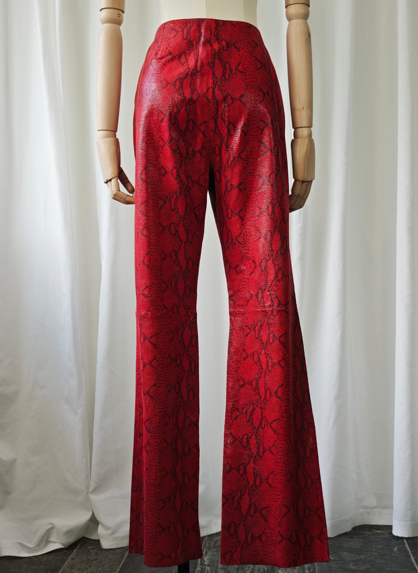 Leather snake print trousers