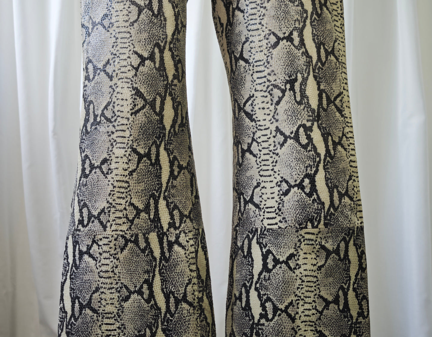 Leather snake print trousers