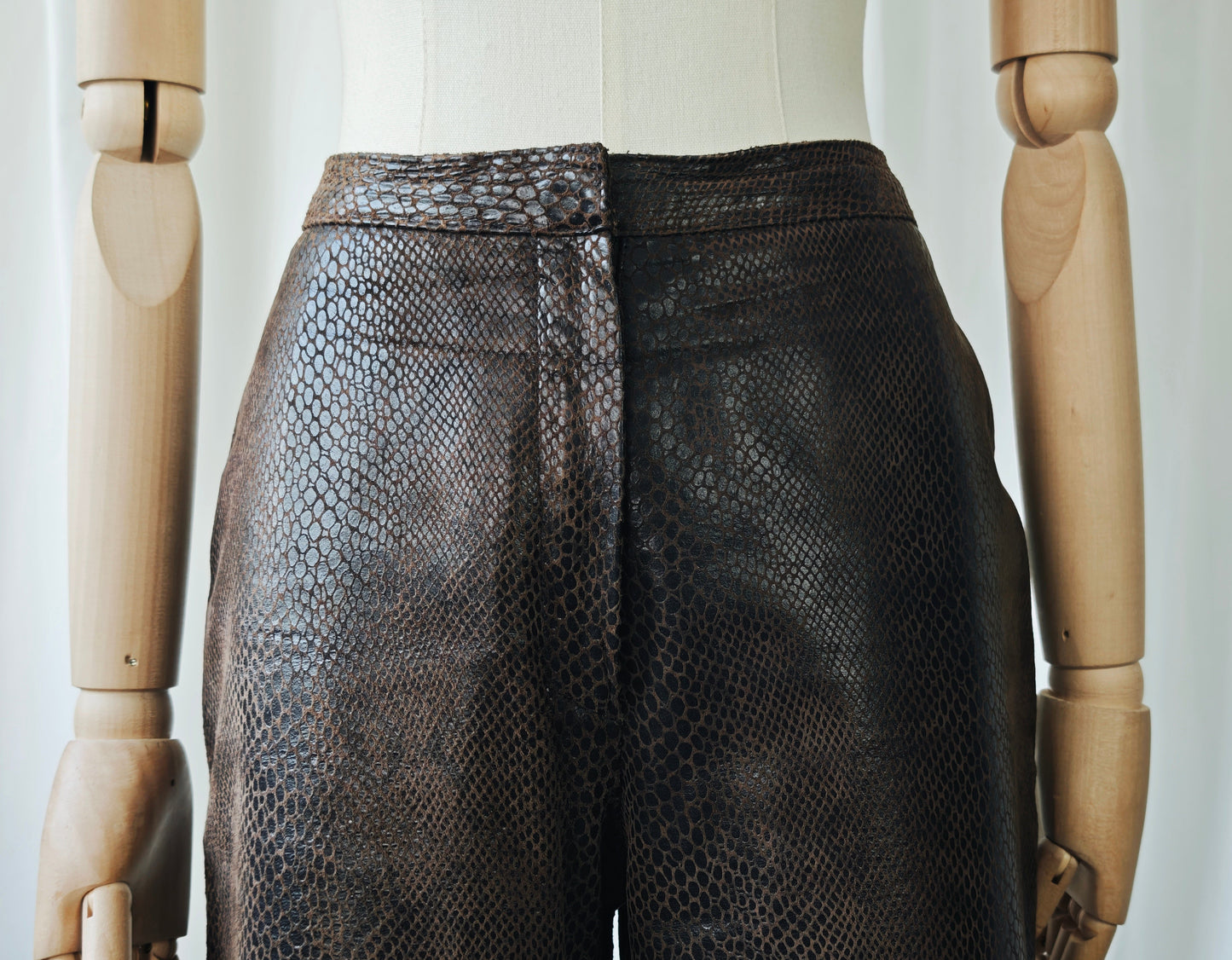 Crocodile print leather trousers
