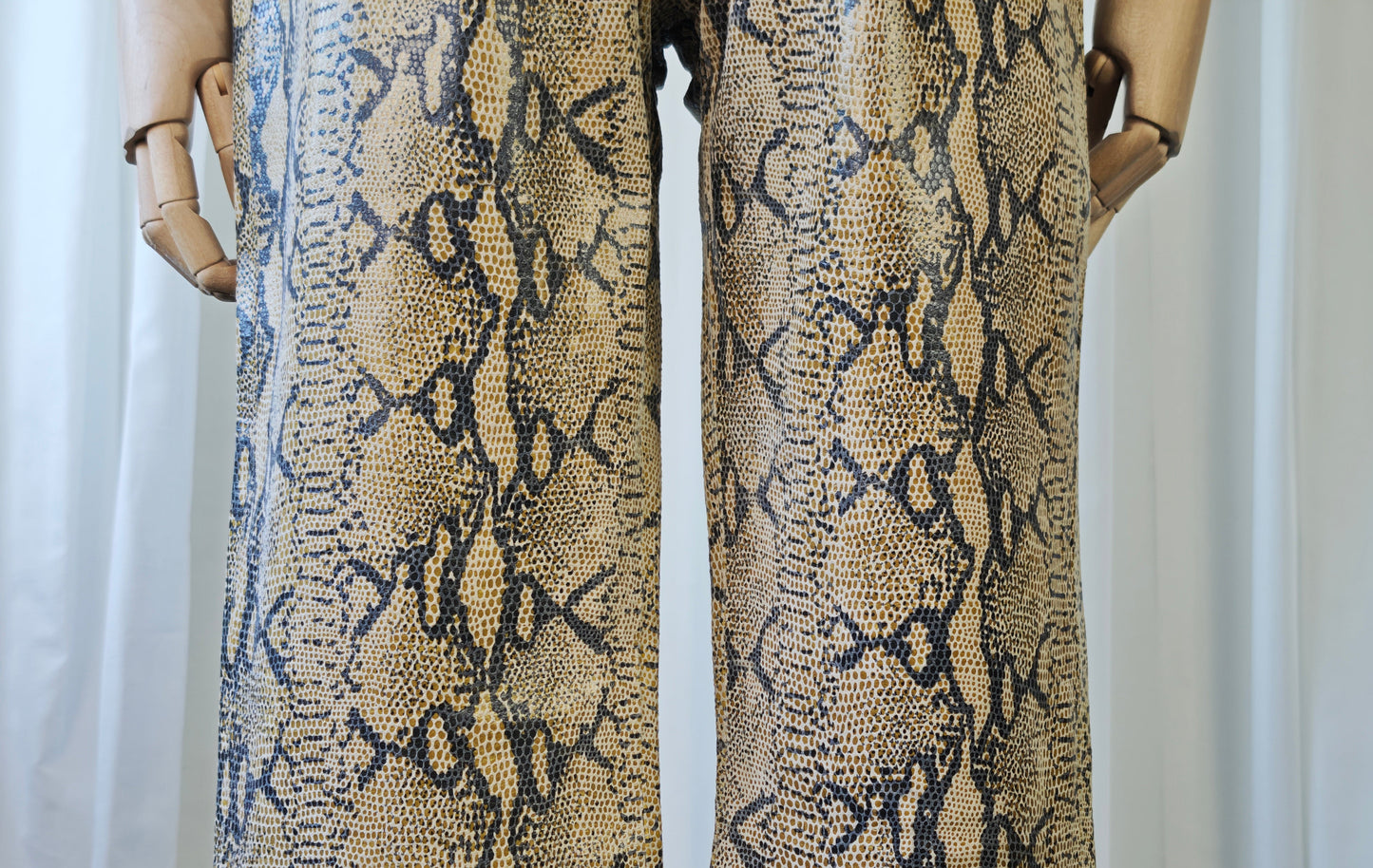 Leather snake print trousers